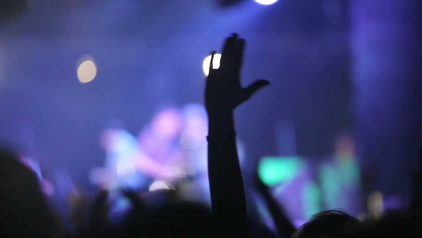 Crowd partying at a rock concert. Hands up