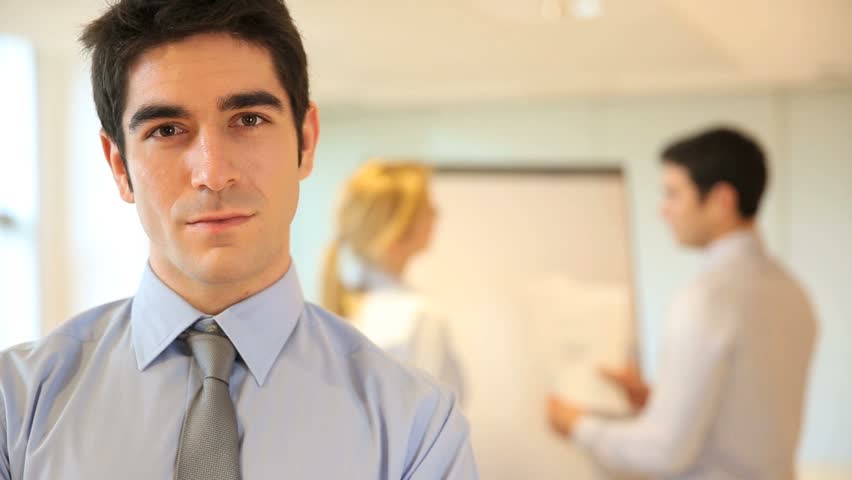 Young businessman presenting company business