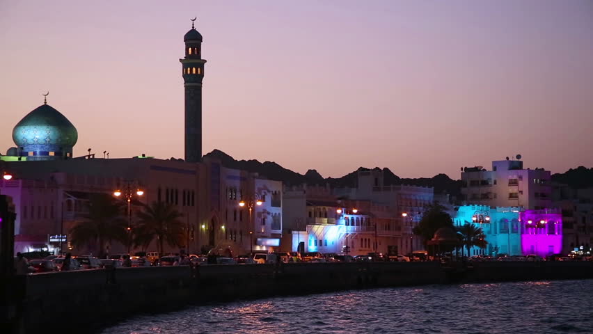 Scenic View of Muttrah Bay during broadcasting of praying from minaret in the evening, Muscat, Oman.