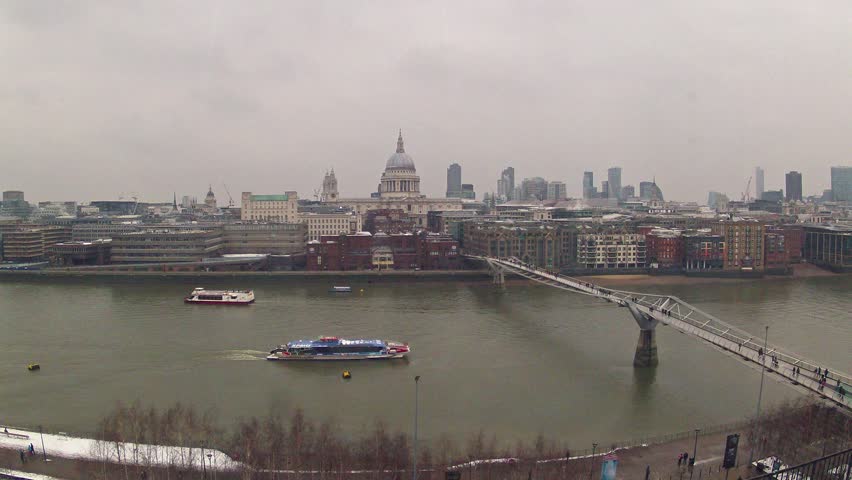 Time lapse video of Millennium Bridge and Thames River at cloudy day in London