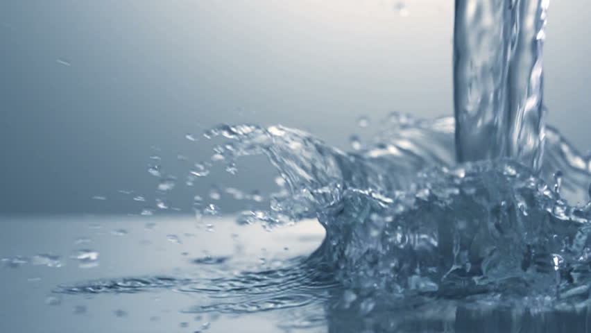 Close up of splash of water. Slow motion.
