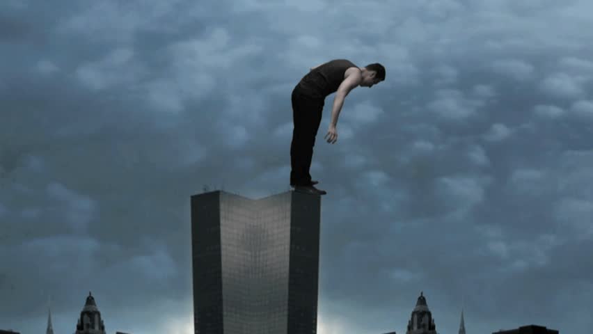 male model powerful superhero standing on top cityscape