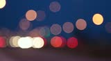 Defocused car lights on a street in Alexandroupolis, Greece