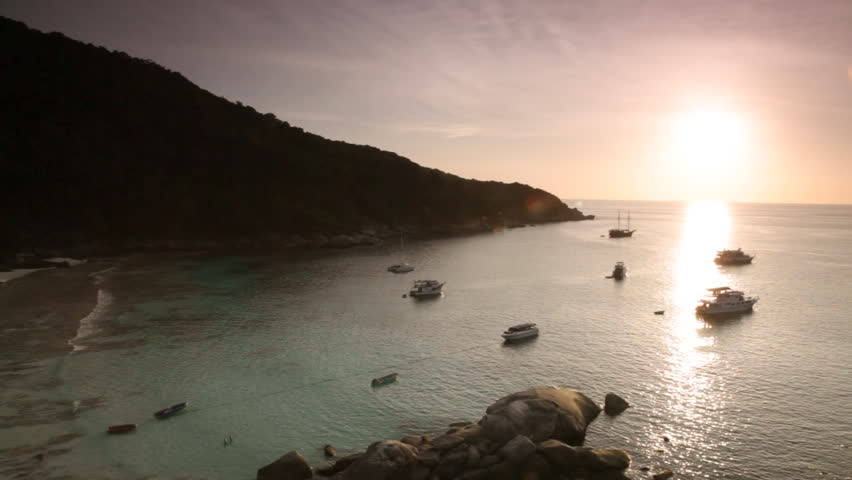 Yachts in Andaman Sea during sunset, Thailand