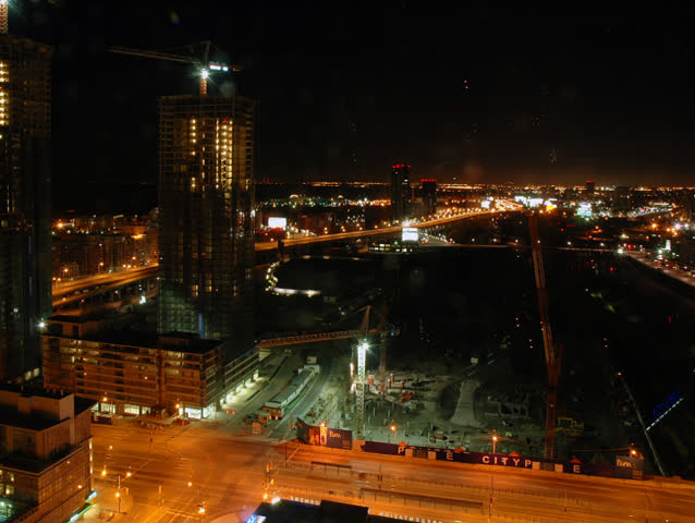 Time lapse. Southwest view 24 hours of construction and city traffic.