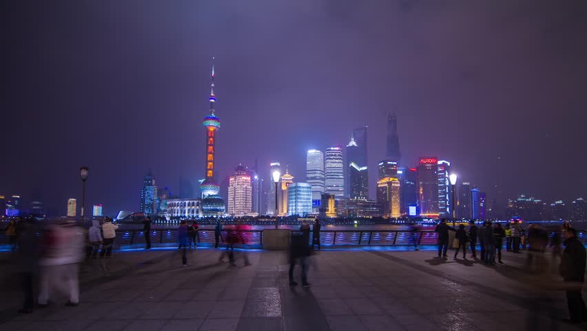 SHANGHAI - CIRCA 2013: Time Lapse of Pudong Skyscraper view with crowds traffic in Shanghai, China. Photo Sequence from DSLR camera and Post production in After Effects
