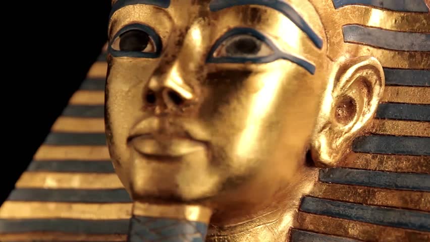 King Tut Sarcophagus rotating over black background closeup - looping video