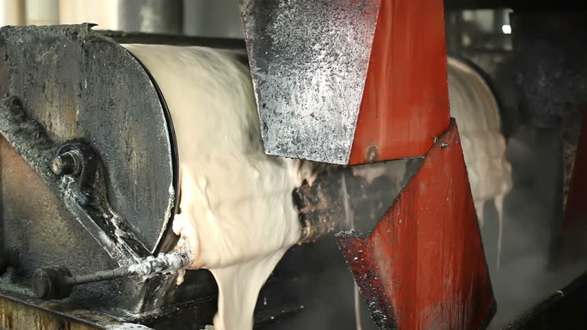 Steam in industrial plants, inside the factory for sugar production. Processing Sugar Beet in Sugar Refinery.