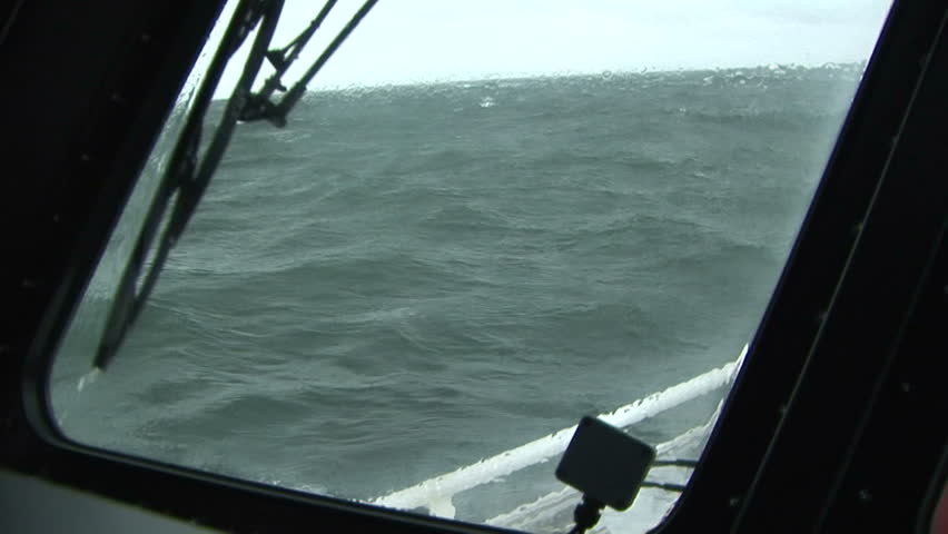 Pilot boat in rough waters sailing on the Columbia River, OR