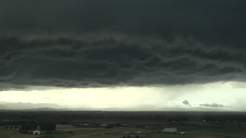 Storm Front. Thunderstorm updrafts triggered by undercutting cold front trigger downpour