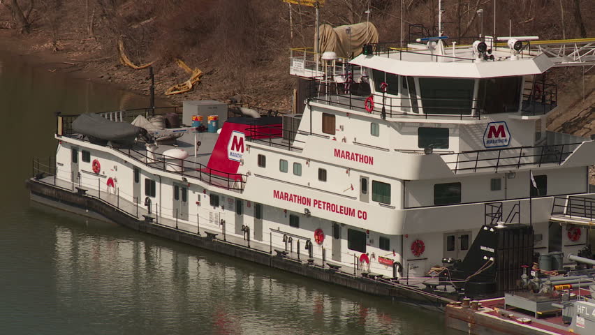 INDUSTRY, PA - MARCH 31: Marathon Petroleum towboat (pushboat) "Marathon" sits docked on the Ohio River on March 31, 2013 at the Industry/Midland, Pennsylvania facility.