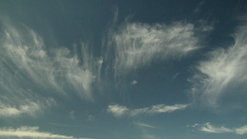 Mares' Tails. Fall streaks of ice crystals from Cirrus Uncinus clouds, sometimes called mares' tails