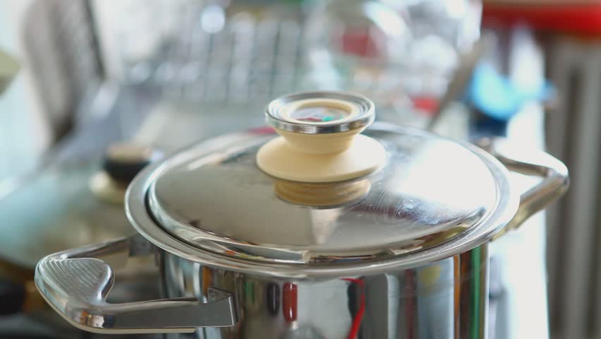 Stirring of boiling meat soup