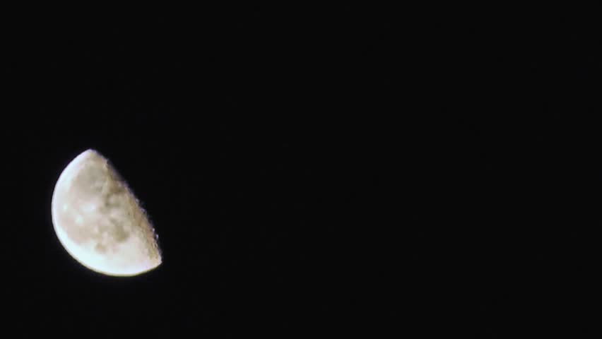 Moon Rising Diagonally Across The Frame 