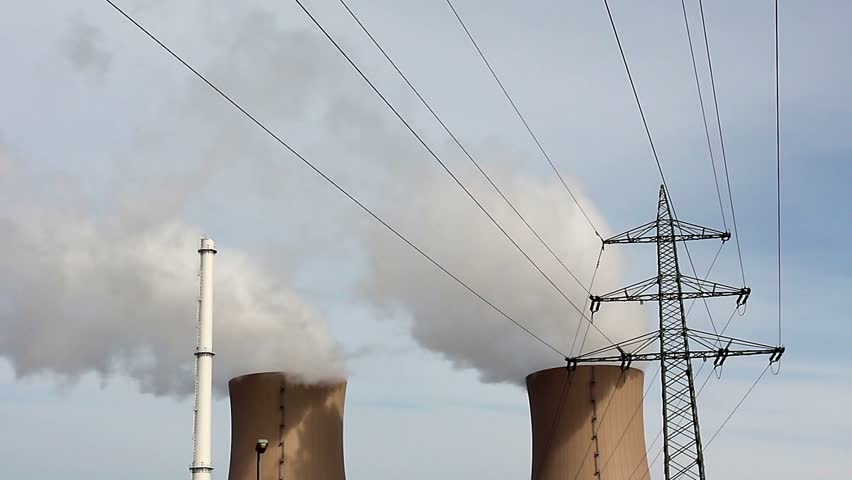 Nuclear plant and high-voltage lines against the sky