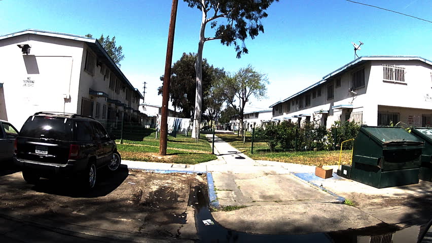 WATTS, CA - APRIL 9, 2013: The point of view of someone driving in a federally funded apartment complex circa 2013 in Watts. An economically depressed community in the Los Angeles Metro Area. 
