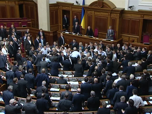 KIEV - MARCH 18: Fight on parliament floor between Nationalists and Communists in Kiev, Ukraine on March 18, 2013.