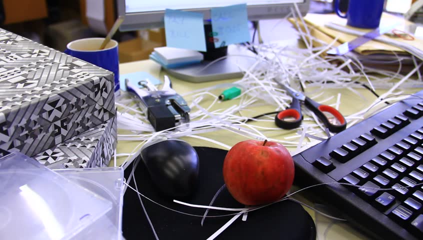 Chaotic office, bad worker, mess and all sorts of supplies.