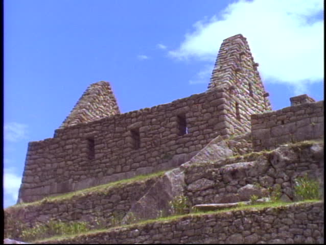 Machu Picchu, Peru, The Andes, detail of stone house, zoom out medium shot of ruins