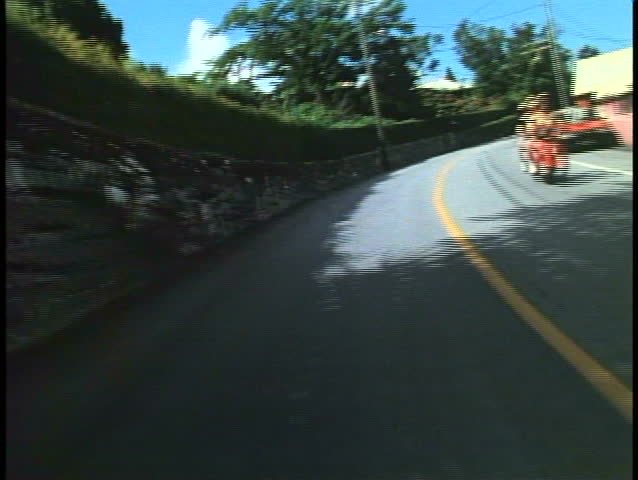 POV from moped, motor scooter, winding road in Bermuda