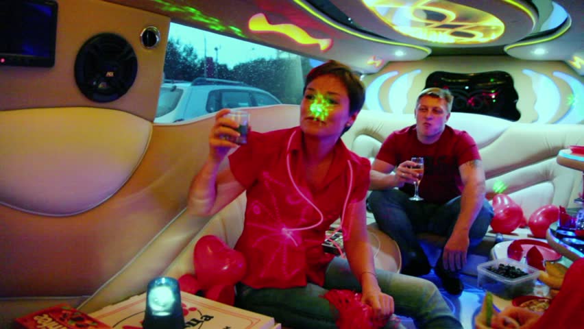 MOSCOW - SEP 3: Guest female speaks toast for newlyweds during ride in limo on September 3, 2011 in Moscow, Russia. In Moscow were registered 97900 marriages in 2011