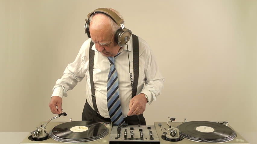 a very funky elderly grandpa dj mixing records
