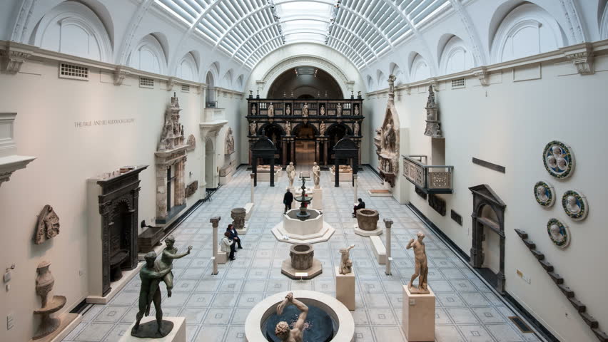 LONDON, UNITED KINGDOM - APRIL 16: People walking inside Victoria and Albert Museum on April 16, 2013 in London, UK. V&A Museum is the world's largest museum of decorative arts and design. 