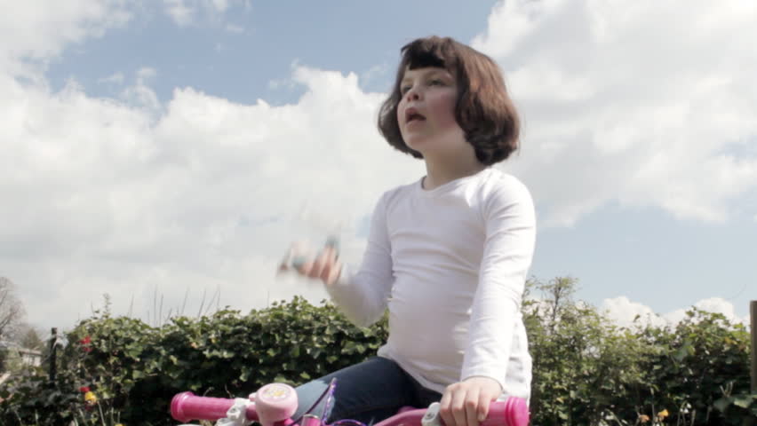 Little girl using asthma inhaler