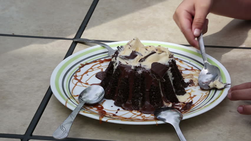 Yummy Chocolate Volcano Cake being gobbled up by some children