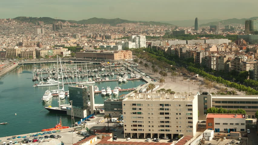 timelapse of the beautiful barcelona skyline shot from a high vantage point
