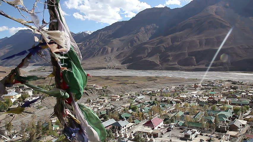 Tibetan flags above the village