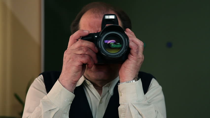 Photo course participant is learning how to take pictures with flash