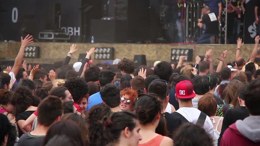ROME, ITALY - MAY 1: People during free "Concerto del Primo Maggio" ("Workers' Day Concert") in Piazza San Giovanni (San Giovanni Square) on Workers' Day, May 1, 2013 in Rome, Italy.