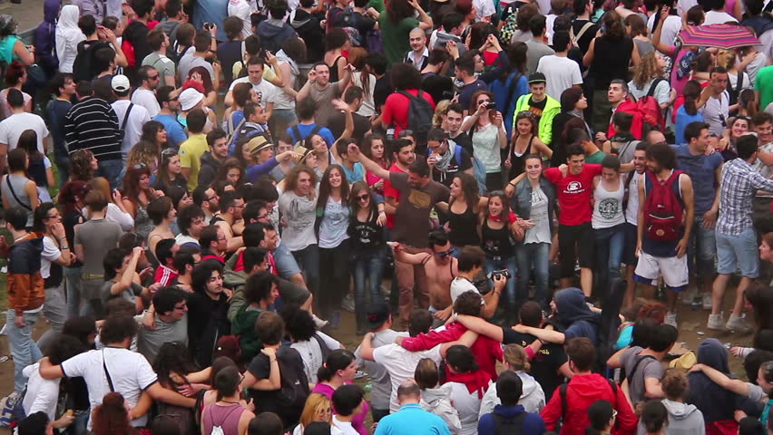 ROME, ITALY - MAY 1: People during free "Concerto del Primo Maggio" ("Workers' Day Concert") in Piazza San Giovanni (San Giovanni Square) on Workers' Day, May 1, 2013 in Rome, Italy.