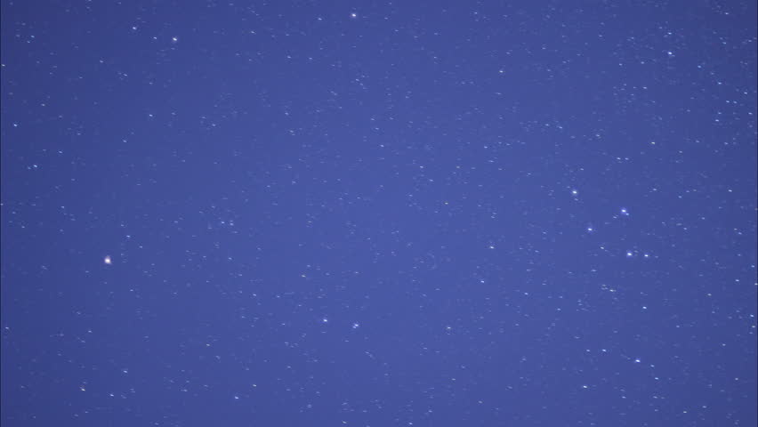 Time lapse, stars go round on the night sky.