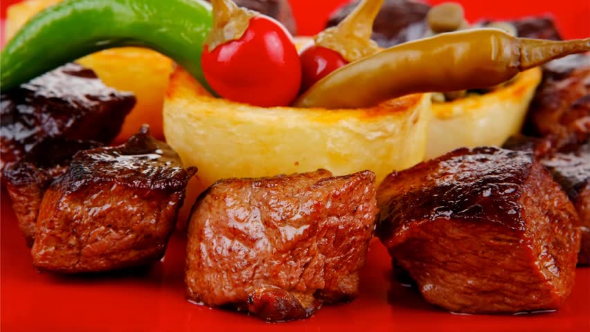 european food: roast beef meat goulash plate with tomatoes and dill 1920x1080 intro motion slow hidef hd