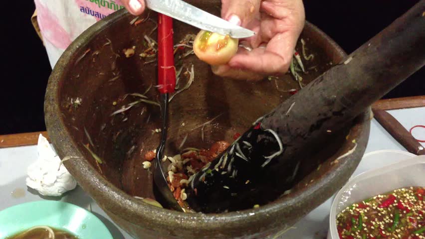 Cooking green papaya salad Thai cuisine spicy " SOM TAM "