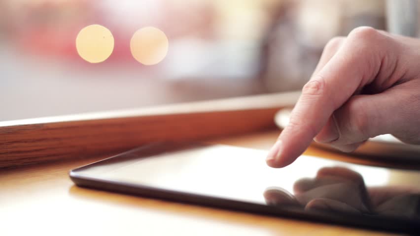 Man hand using tablet computer pc ipad