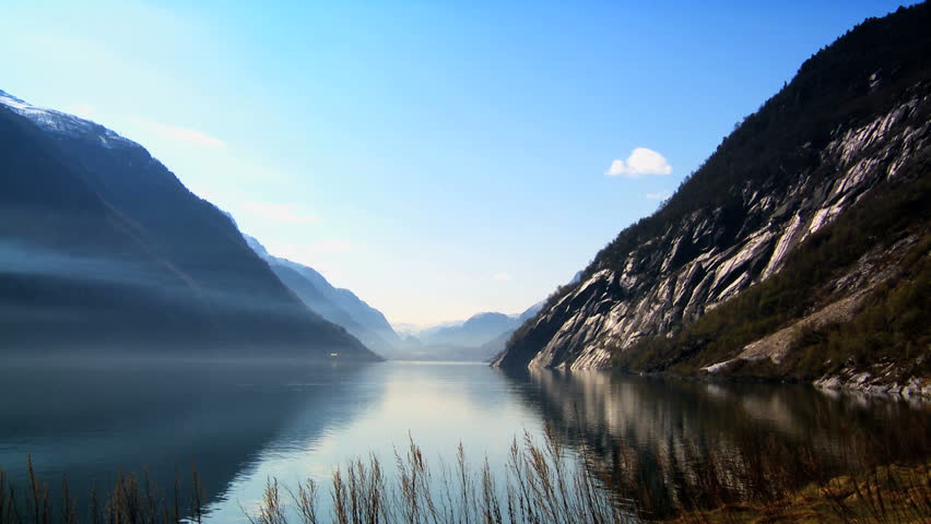 Crystal clear waters of a glacial fjord in Norway