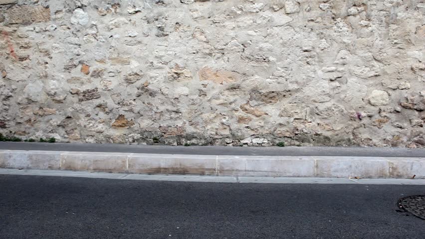 Girl on bike passing by
