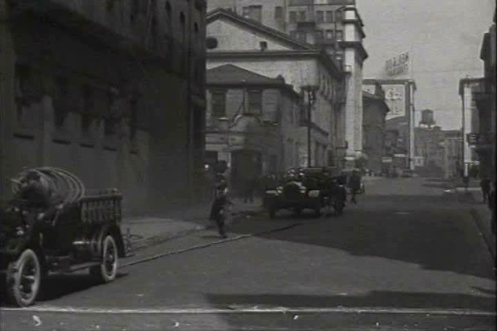1910s, 1920s - Firemen go put out a fire