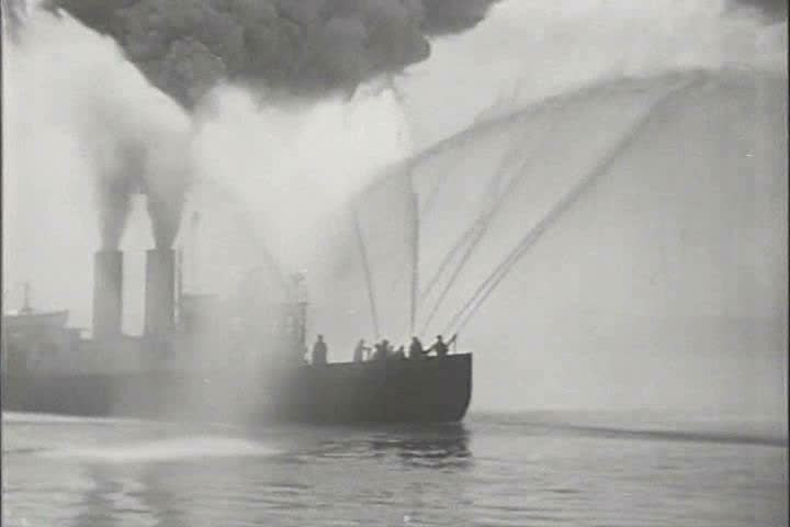 1910s, 1920s - A fireboat in a boatyard.