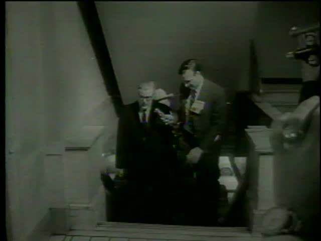 Defense attorney Melvin Mouron Belli walks to the court room, Dallas circa 1964-MGM PICTURES, UNIVERSAL-INTERNATIONAL NEWSREEL, USA, filmed in 1964