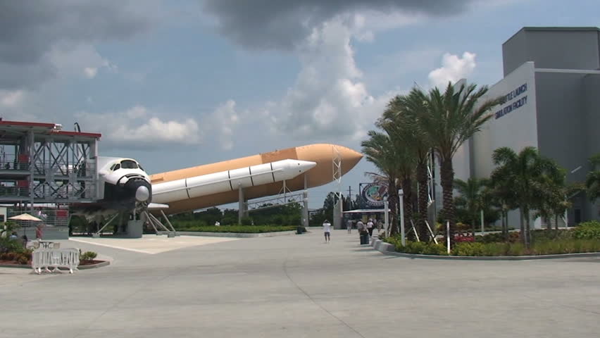 KENNEDY SPACE CENTER - MAY 22 2009: Tourists  starting to return to popular vacation spots like the Kennedy Space Center after the world wide recession starts showing signs of recovery. 