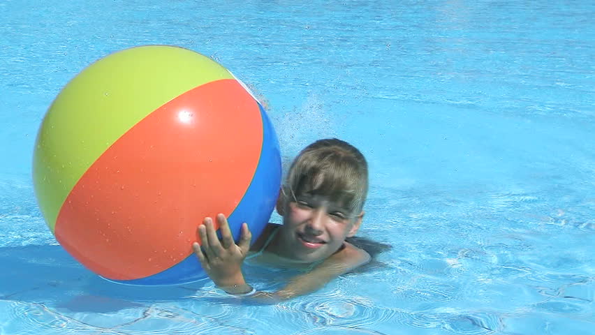 Child Playing Beach Ball In Swimming Pool. Stock Footage Video 4254929