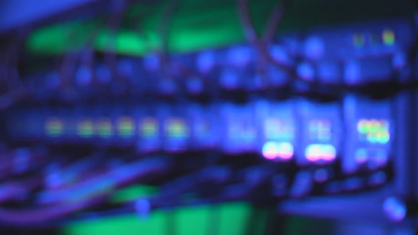 Fiber optic and ethernet cables connected into media converters