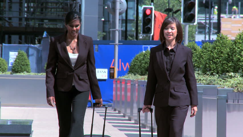 Smart city businesswomen preparing to travel from city airport