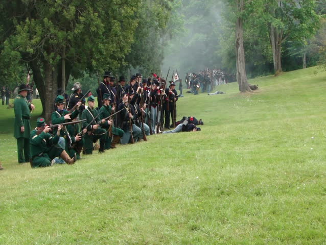 PORT GAMBLE, WA - JUN 20: Civil War re-enactors participate in a mock battle as Union infantry line on June 20, 2009 in Port Gamble, WA.