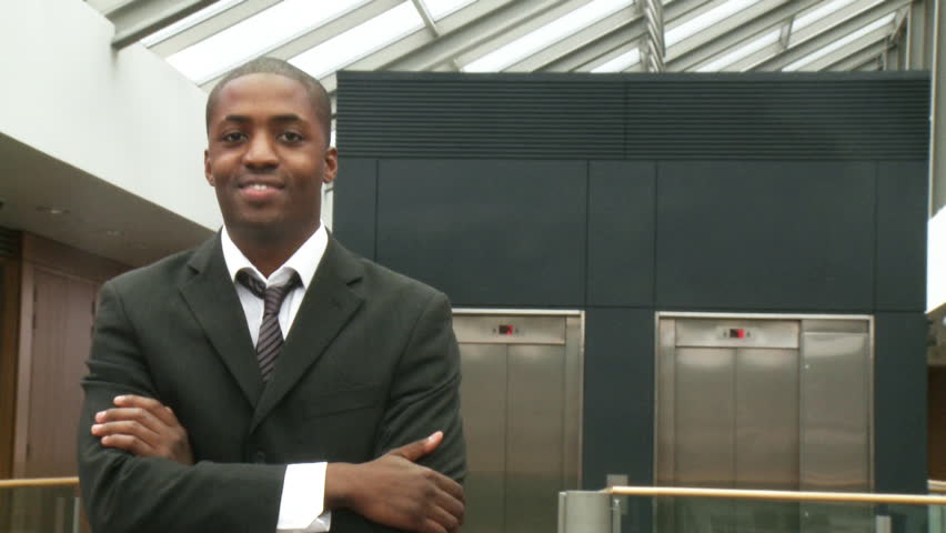 Afro-American businessman smiling at the camera 