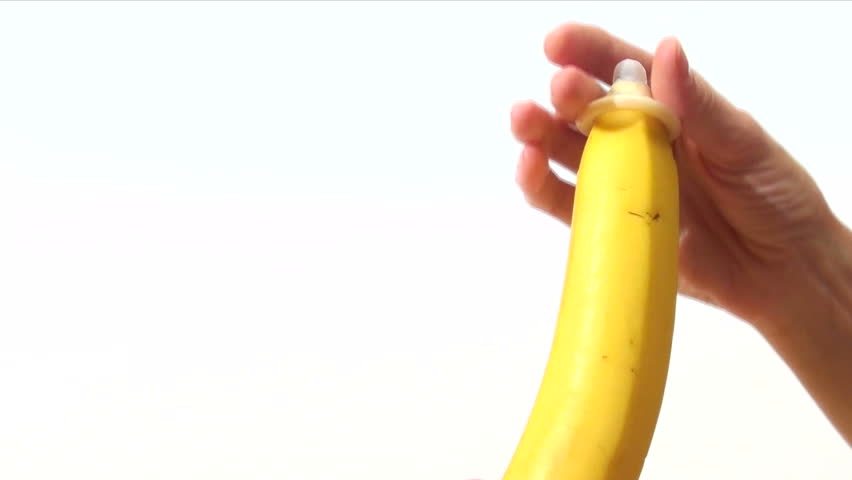 Condom on banana with copy space